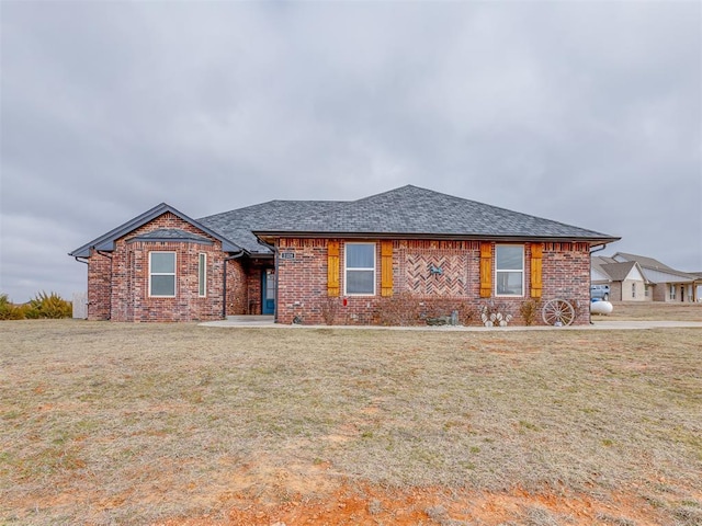 ranch-style house with a front yard