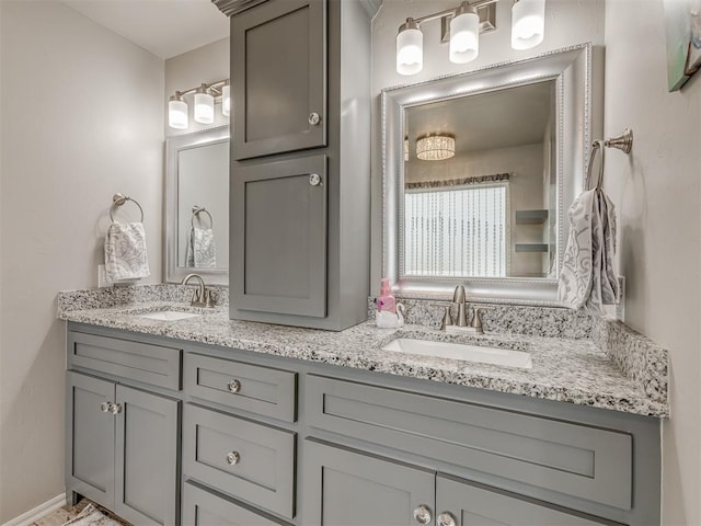 bathroom featuring double vanity and a sink