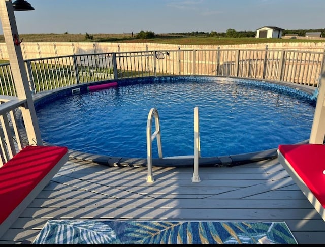 view of pool featuring fence and a fenced in pool