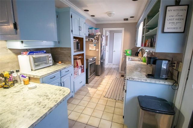 kitchen with blue cabinets, sink, crown molding, light tile patterned floors, and stainless steel appliances