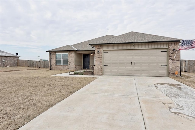 ranch-style home with driveway, an attached garage, fence, and brick siding