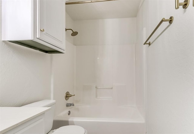 full bath featuring toilet, shower / washtub combination, and vanity