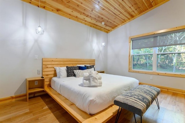 639 Woodland Hills Trl, Broken Bow, OK 74728 - bedroom featuring lofted ceiling, wood-type flooring, and wooden ceiling