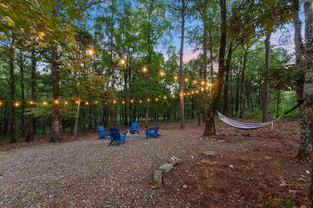 639 Woodland Hills Trl, Broken Bow, OK 74728 - view of playground at dusk