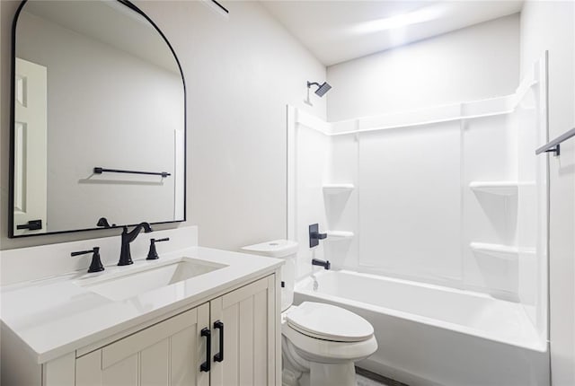 full bathroom with vanity, shower / washtub combination, and toilet