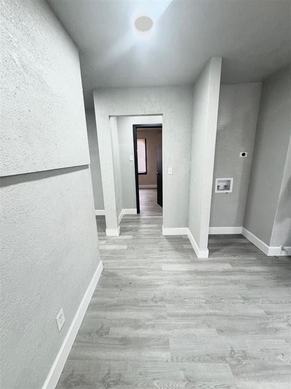 hallway featuring light wood-type flooring