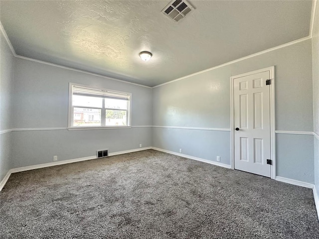 unfurnished room featuring crown molding, a textured ceiling, and carpet flooring