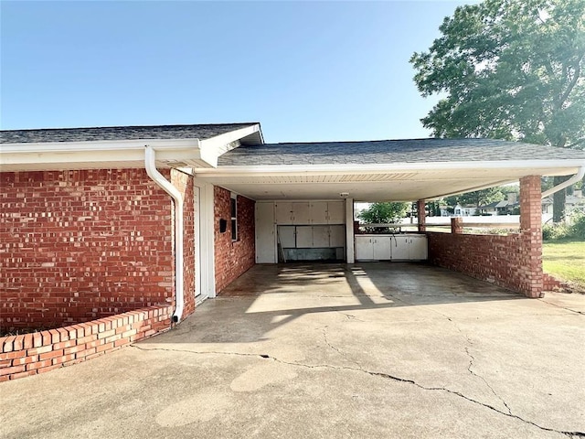 view of parking / parking lot with a carport