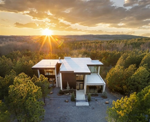 83 Sweet Magnolia Ln, Broken Bow, OK 74728 - view of aerial view at dusk