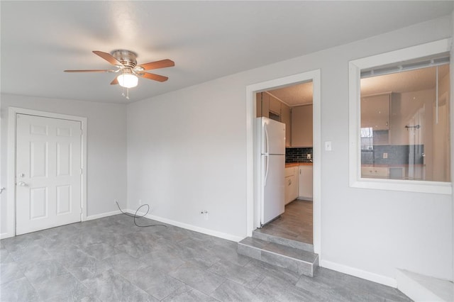 empty room with ceiling fan