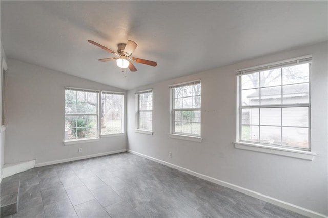 unfurnished room with vaulted ceiling and ceiling fan