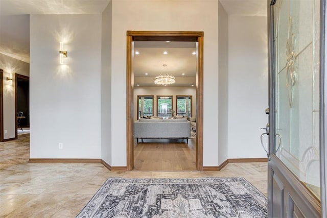 10401 Fawn Trace Rd, Mustang, OK 73064 - entrance foyer featuring baseboards, recessed lighting, and a notable chandelier