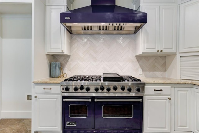 10401 Fawn Trace Rd, Mustang, OK 73064 - kitchen with wall chimney exhaust hood, white cabinets, and double oven range