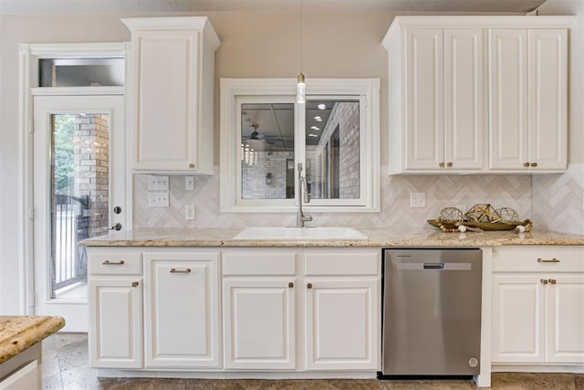 10401 Fawn Trace Rd, Mustang, OK 73064 - kitchen featuring dishwasher, backsplash, a sink, and white cabinetry