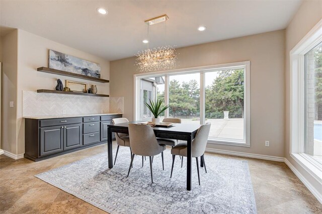 10401 Fawn Trace Rd, Mustang, OK 73064 - dining space featuring recessed lighting, an inviting chandelier, and baseboards
