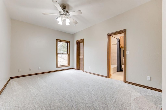 10401 Fawn Trace Rd, Mustang, OK 73064 - unfurnished room with light carpet, a ceiling fan, and baseboards