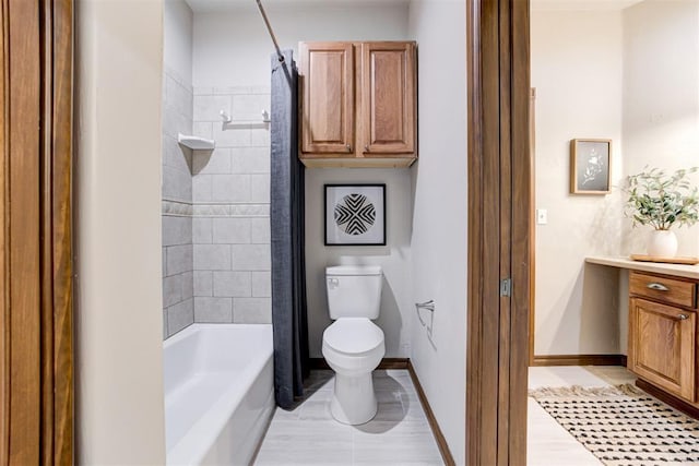 10401 Fawn Trace Rd, Mustang, OK 73064 - full bath with vanity, shower / bathtub combination with curtain, baseboards, toilet, and tile patterned flooring