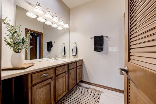 10401 Fawn Trace Rd, Mustang, OK 73064 - bathroom featuring baseboards, vanity, and tile patterned floors