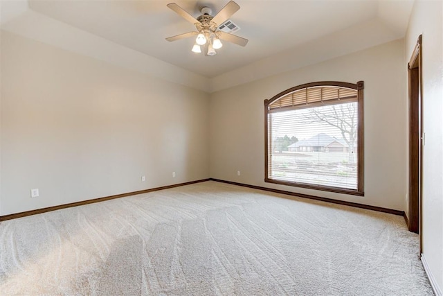 10401 Fawn Trace Rd, Mustang, OK 73064 - unfurnished room with visible vents, light carpet, a ceiling fan, and baseboards