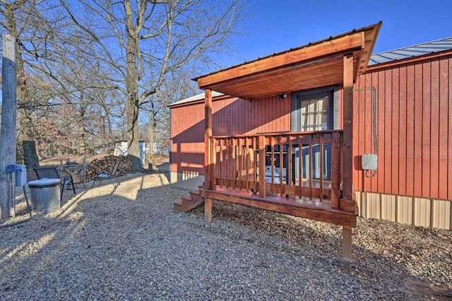 1985 Belpine Loop, Broken Bow, OK 74728 - back of property featuring a wooden deck