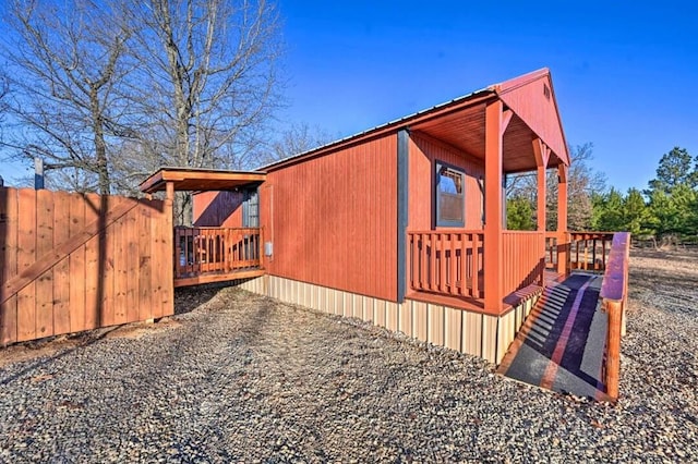 1985 Belpine Loop, Broken Bow, OK 74728 - view of property exterior with a deck