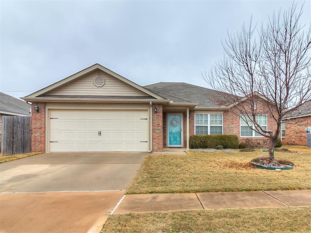 single story home with a garage and a front yard