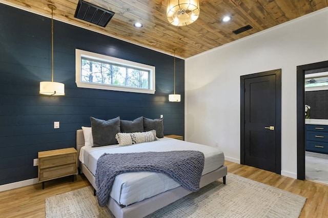 bedroom featuring wood ceiling and light hardwood / wood-style flooring