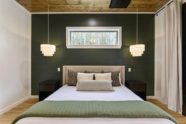 bedroom featuring hardwood / wood-style flooring