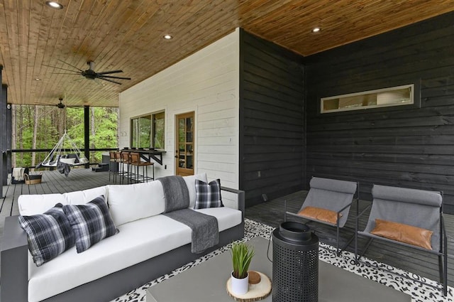 view of patio featuring ceiling fan and outdoor lounge area