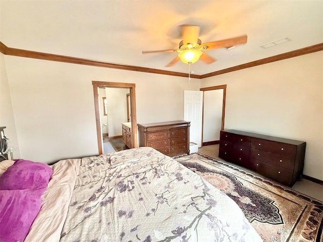 bedroom featuring visible vents, baseboards, connected bathroom, ceiling fan, and ornamental molding