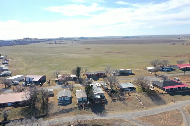 birds eye view of property featuring a rural view