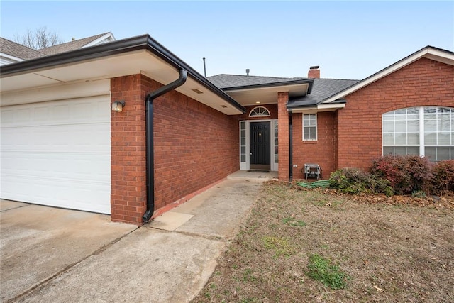 property entrance featuring a garage