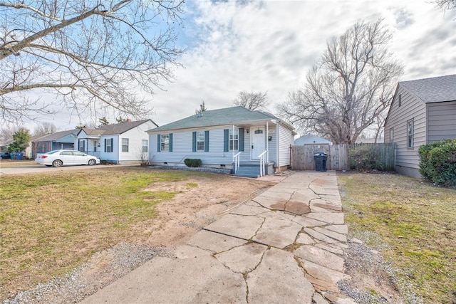 ranch-style house with a front yard