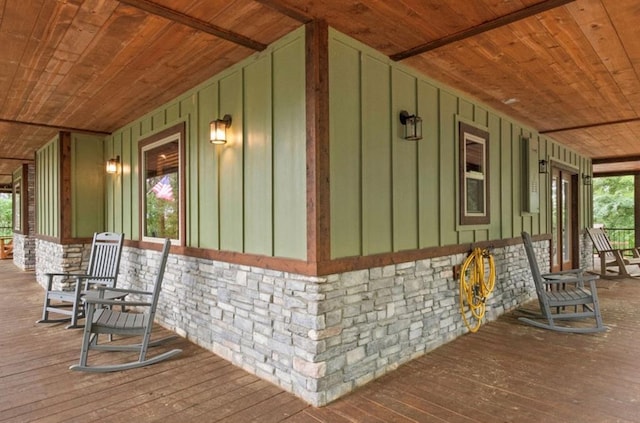 view of property exterior with covered porch