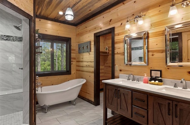 bathroom featuring vanity, wooden walls, and plus walk in shower