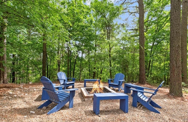 exterior space with a fire pit