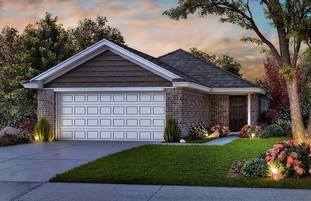 view of front of property with a garage, concrete driveway, a yard, and brick siding