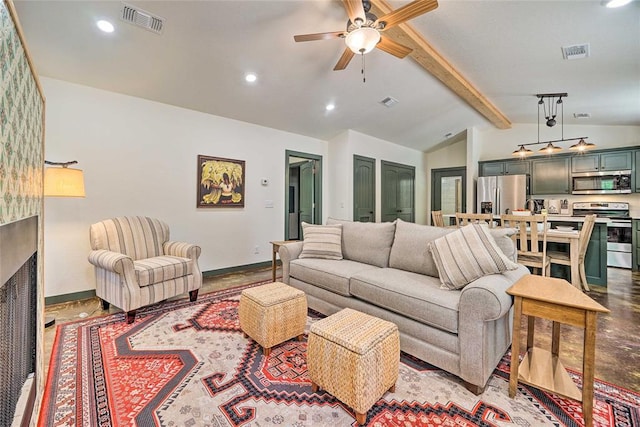 living room featuring vaulted ceiling with beams, a fireplace, and ceiling fan