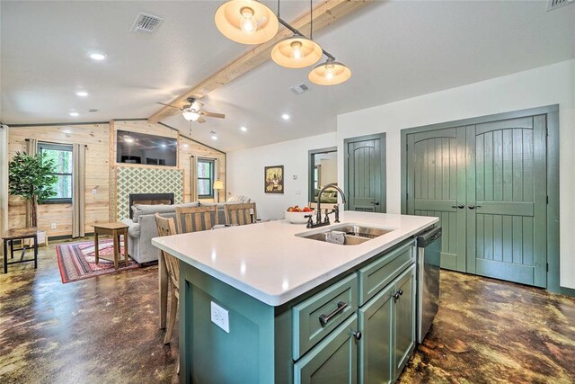 670 Pine Meadow Ln, Broken Bow, OK 74728 - kitchen featuring pendant lighting, lofted ceiling with beams, sink, a kitchen island with sink, and stainless steel dishwasher
