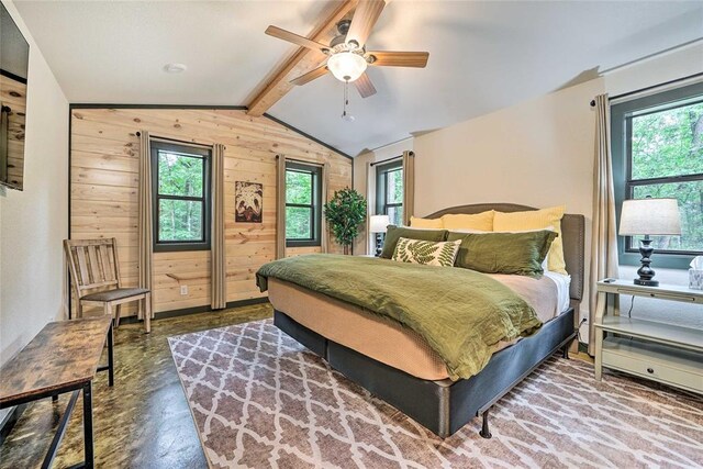 670 Pine Meadow Ln, Broken Bow, OK 74728 - bedroom with wooden walls, multiple windows, and vaulted ceiling with beams