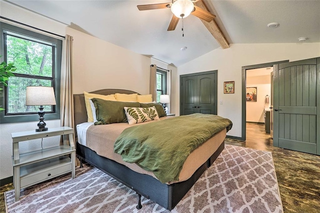 670 Pine Meadow Ln, Broken Bow, OK 74728 - bedroom with multiple windows, vaulted ceiling with beams, ceiling fan, and a closet