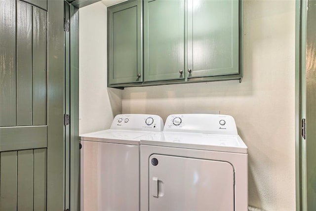 670 Pine Meadow Ln, Broken Bow, OK 74728 - laundry area with cabinets and separate washer and dryer