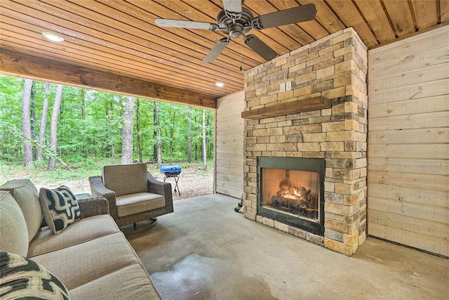 670 Pine Meadow Ln, Broken Bow, OK 74728 - view of patio with ceiling fan and an outdoor stone fireplace