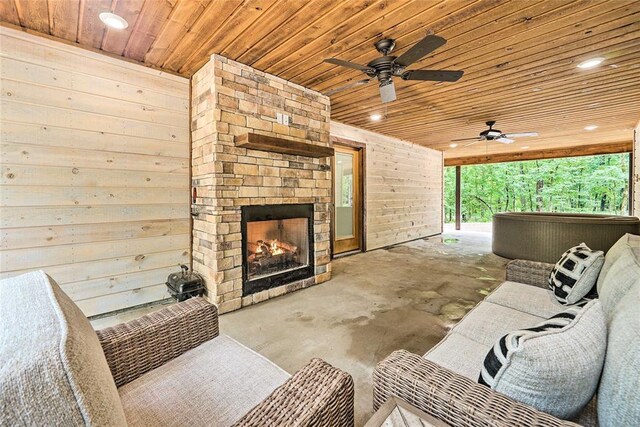 670 Pine Meadow Ln, Broken Bow, OK 74728 - view of patio featuring ceiling fan and an outdoor stone fireplace