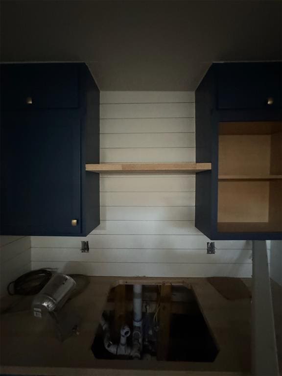 kitchen with blue cabinetry