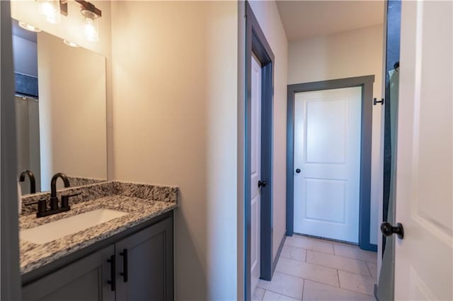 bathroom featuring vanity and tile patterned floors