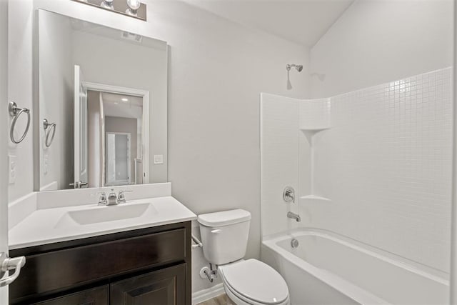 full bathroom featuring shower / bathtub combination, vanity, toilet, and lofted ceiling