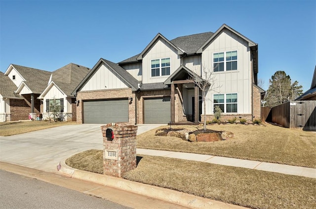 craftsman inspired home featuring a garage and a front yard