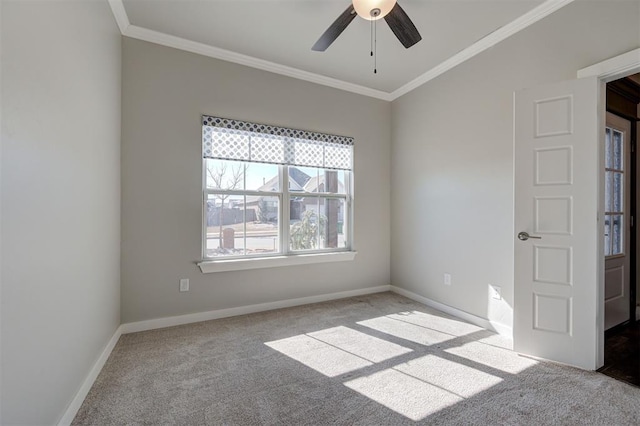 unfurnished room featuring ceiling fan, ornamental molding, and light carpet