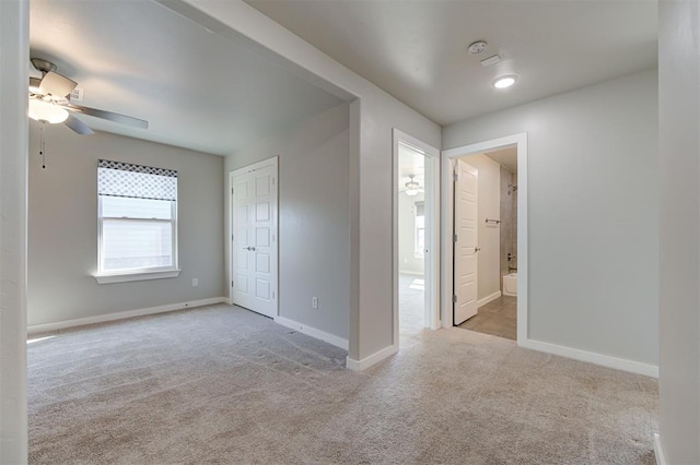 interior space featuring ceiling fan